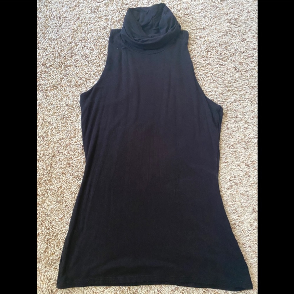Black turtle neck sleeveless top